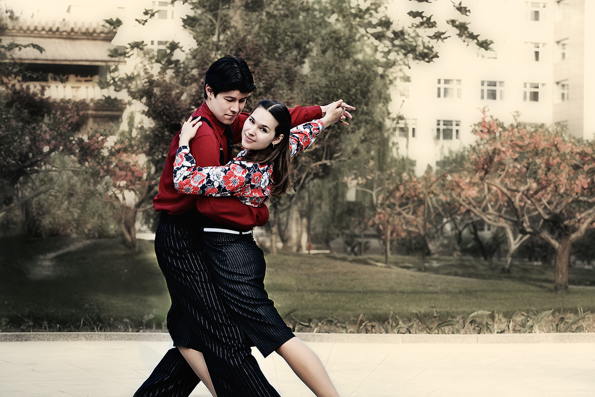 Over processed to give it that vintage "retro pop." Beijing has a thriving Lindy Hop dance scene. The woman in this picture, Leru, designs Swing Outfits. Both are wearing clothes of her own design.